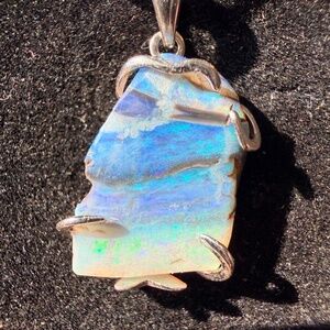 4.10 carat Australian boulder opal freeform in a 925 pendant with chain